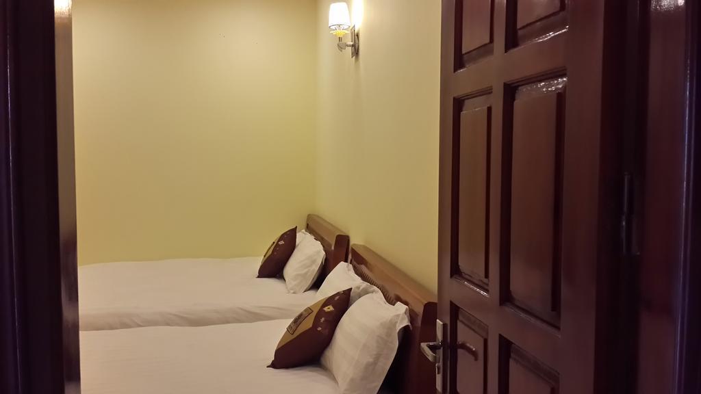Quyet Tinh Sapa Backpacker Hotel Rum bild